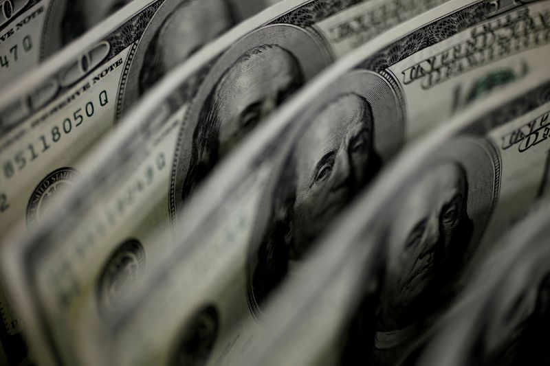 Dollar higher as virus restrictions knock risk sentiment