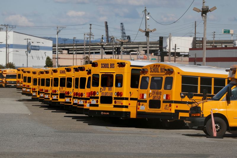 &copy; Reuters. FILE PHOTO: School buses are seen parked at First Student Charter Bus Rental in San Francisco, California, U.S. April 7, 2020. REUTERS/Stephen Lam/File Photo