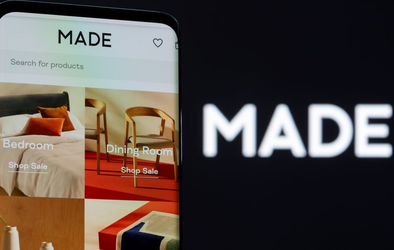 &copy; Reuters. Made.com web site is seen on a smartphone in front of a displayed logo in this illustration taken June 16, 2021. REUTERS/Dado Ruvic/Illustration
