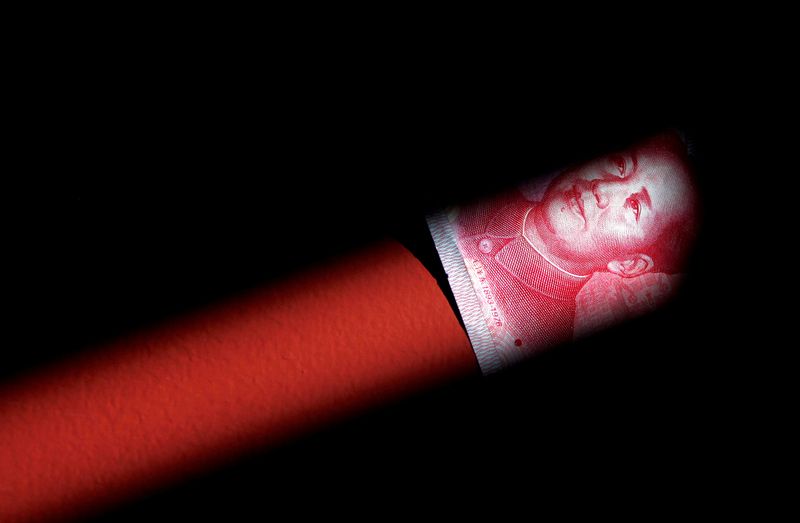 &copy; Reuters. FILE PHOTO: A 100 Yuan note is seen in this illustration picture in Beijing March 7, 2011.  REUTERS/David Gray