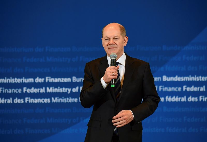&copy; Reuters. The outgoing Finance Minister and new German Chancellor Minister Olaf Scholz delivers a speech during the handing-over ceremony with his successor in the German Federal Ministry of Finances in Berlin, Germany, December 9, 2021. Tobias Schwarz/Pool via REU