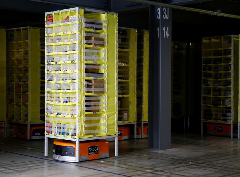 &copy; Reuters. FILE PHOTO: An Amazon Robotics drive unit carries shelves of inventory at the Amazon fulfillment center in Kent, Washington, U.S., October 24, 2018. REUTERS/Lindsey Wasson