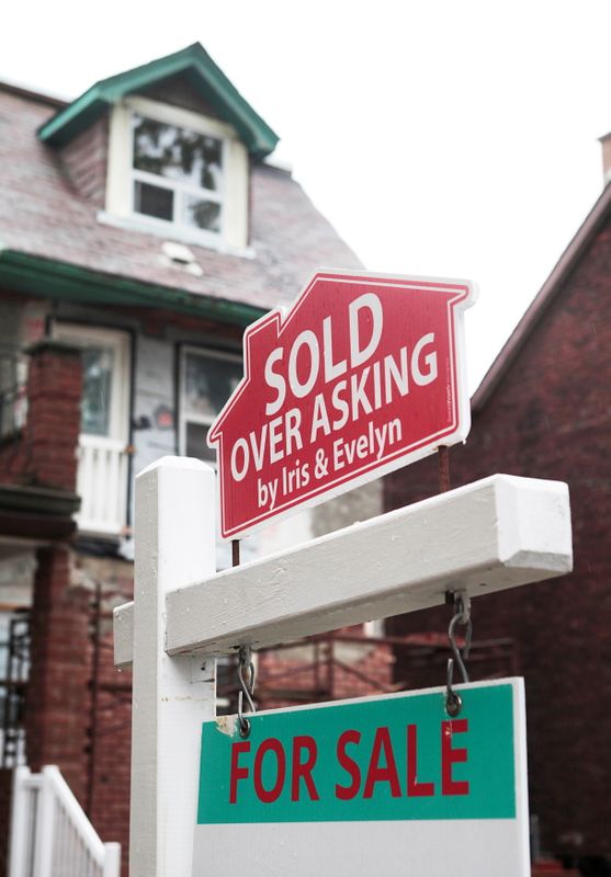 &copy; Reuters. FILE PHOTO: A "Sold over asking" sign is on display on a house for sale in Toronto's housing market in Toronto, Ontario, Canada, October 21, 2016. REUTERS/Hyungwon Kang/File Photo