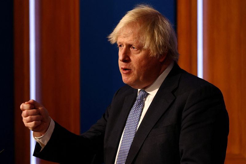 &copy; Reuters. FILE PHOTO: British Prime Minister Boris Johnson holds a news conference for the latest coronavirus disease (COVID-19) update in the Downing Street briefing room, in London, Britain December 8, 2021. Adrian Dennis/Pool via REUTERS