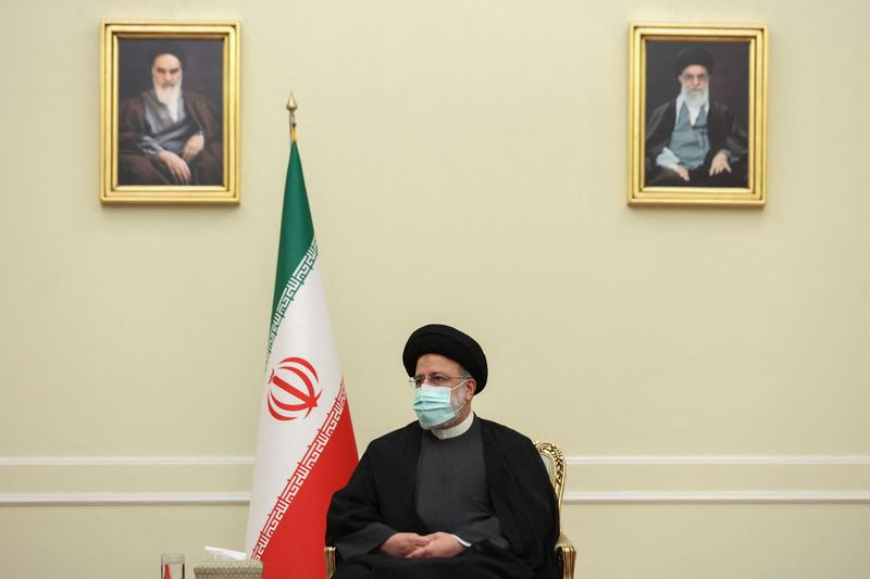 &copy; Reuters. FILE PHOTO: Iran's President Ebrahim Raisi looks on during a meeting with Syria's Foreign Minister Faisal Mekdad in Tehran, Iran, December 6, 2021. Majid Asgaripour/WANA (West Asia News Agency) via REUTERS 