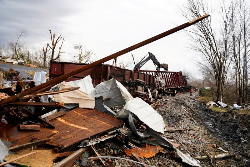 &copy; Reuters. The scene of a train derailment is pictured after a devastating outbreak of tornadoes ripped through several U.S. states in Earlington, Kentucky, U.S. December 11, 2021.  REUTERS/Cheney Orr