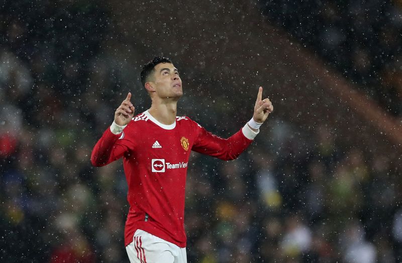&copy; Reuters. Soccer Football - Premier League - Norwich City v Manchester United - Carrow Road, Norwich, Britain - December 11, 2021 Manchester United's Cristiano Ronaldo celebrates scoring their first goal from the penalty spot Action Images via Reuters/Peter Cziborr