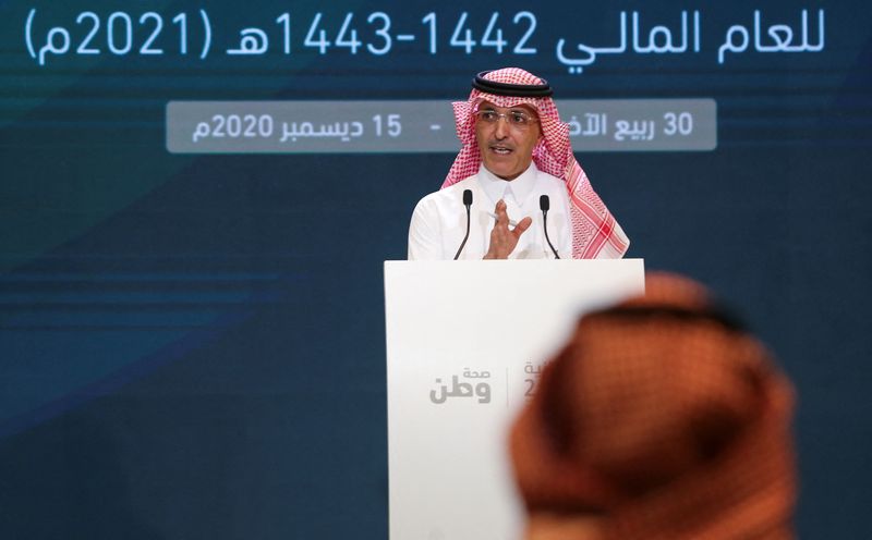 &copy; Reuters. وزير المالية السعودي محمد الجدعان يتحدث خلال مؤتمر صحفي في الرياض يوم 15 ديسمبر كانون الأول 2020. تصوير: أحمد يسري - رويترز. 