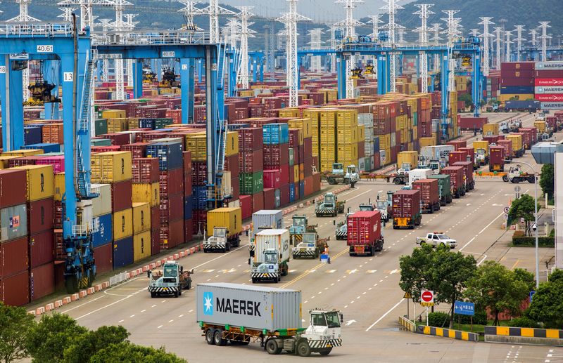 &copy; Reuters. FILE PHOTO: Lines of trucks are seen at a container terminal of Ningbo Zhoushan port in Zhejiang province, China, August 15, 2021. Picture taken August 15, 2021. cnsphoto via REUTERS  
