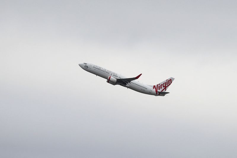 &copy; Reuters. A Virgin Australia Airlines Boeing 737-800 plane takes off from Sydney Airport in Sydney, Australia, October 28, 2020.  REUTERS/Loren Elliott