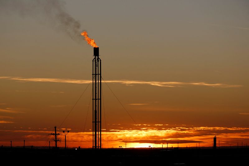 &copy; Reuters. FILE PHOTO: A flare burns excess natural gas in the Permian Basin in Loving County, Texas, U.S. November 23, 2019. Picture taken November 23, 2019.  REUTERS/Angus Mordant