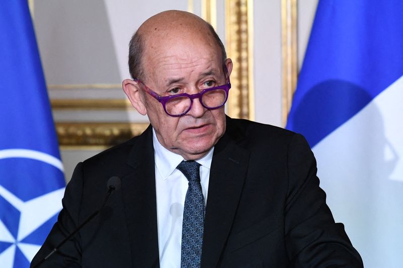 &copy; Reuters. FILE PHOTO: French Foreign Affairs Minister Jean-Yves Le Drian speaks at a news conference following a meeting with NATO's Secretary General and the French defence minster in Paris, France December 10, 2021. Bertrand Guay/Pool via REUTERS/File Photo