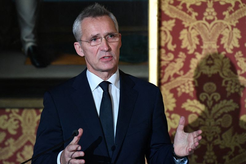 © Reuters. FILE PHOTO: NATO Secretary General Jens Stoltenberg speaks at a news conference following a meeting with French defence and foreign ministers in Paris, France December 10, 2021. Bertrand Guay/Pool via REUTERS