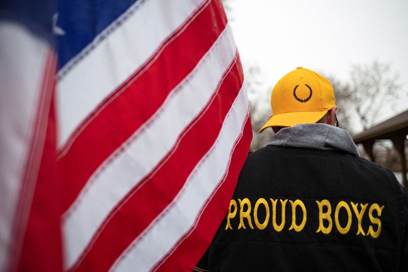 &copy; Reuters. A member of the Proud Boys attends a "Let's Go Brandon Festival" rally in opposition to U.S. President Joe Biden, Ortonville, Michigan, November 20, 2021.  REUTERS/Emily Elconin/Files