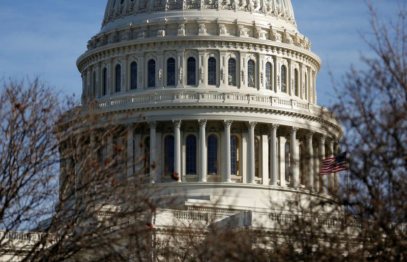 &copy; Reuters. 　１２月１４日、米下院は、強制労働を巡る懸念を理由に中国・新疆ウイグル自治区からの輸入を禁じる法案を可決した。写真はワシントンで２０１８年１月撮影（２０２１年　ロイター／