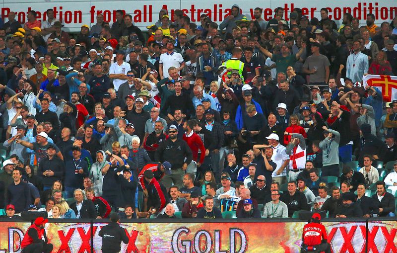 © Reuters. FILE PHOTO: Cricket - Ashes test match - Australia v England - Adelaide Oval, Adelaide, Australia, December 5, 2017. Members of the English supporters group known as the 'Barmy Army' cheer during the fourth day of the second Ashes cricket test match. Picture taken December 5, 2017.     REUTERS/David Gray