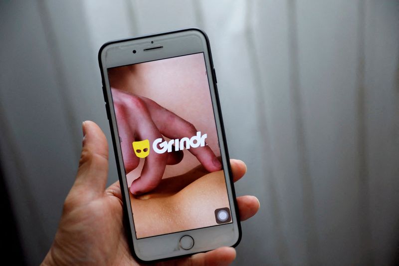 &copy; Reuters. FILE PHOTO: The Grindr app is seen on a mobile phone in this photo illustration taken in Shanghai, China, March 28, 2019. REUTERS/Aly Song/Illustration/File Photo