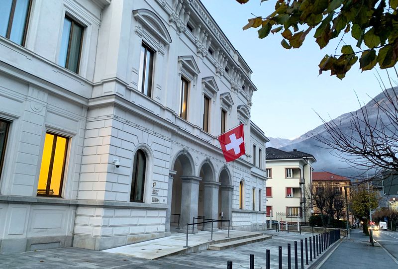 &copy; Reuters. FILE PHOTO: Switzerland's national flag is displayed on the Swiss Federal Criminal Court (Bundesstrafgericht) building in Bellinzona, Switzerland, December 3, 2020. REUTERS/Emma Farge/File Photo