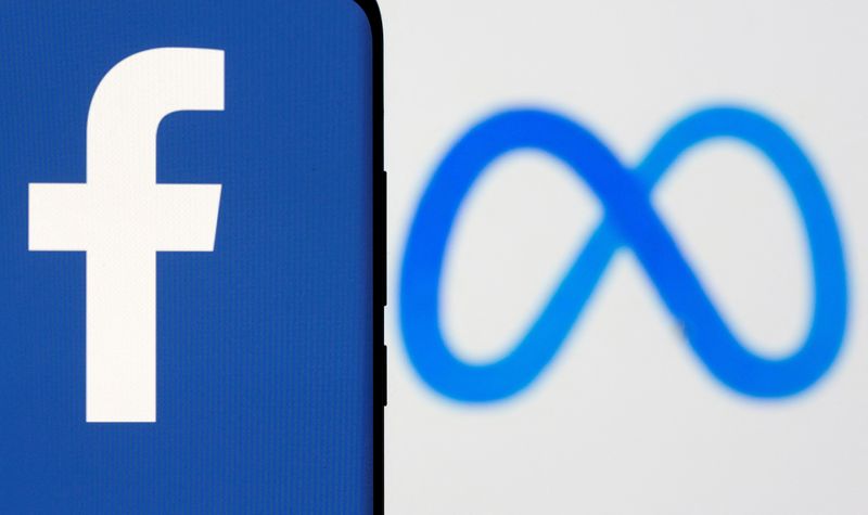 &copy; Reuters. FILE PHOTO: Facebook's new rebrand logo Meta is displayed behind a smartphone with the Facebook logo in this illustration picture taken October 28, 2021. REUTERS/Dado Ruvic