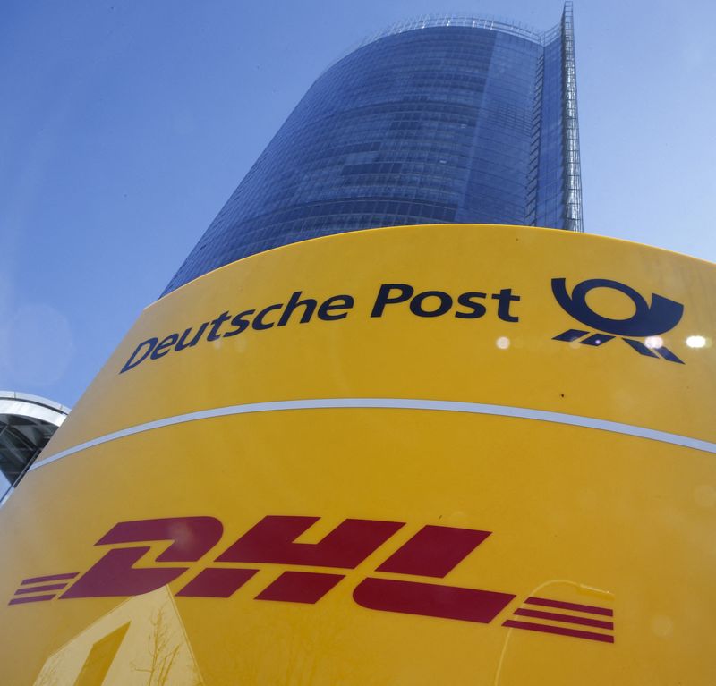 &copy; Reuters. FILE PHOTO: A Deutche Post and DHL sign stands in front of the Bonn Post Tower, the headquarters of German postal and logistics group Deutsche Post DHL in Bonn March 11, 2015.  REUTERS/Wolfgang Rattay