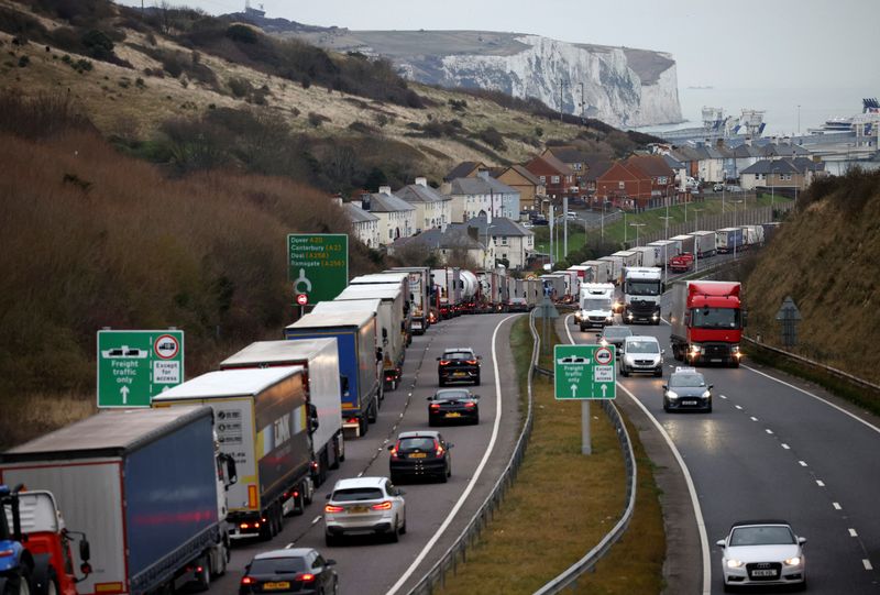 &copy; Reuters. Freight lorries are seen queuing on A20 road into the Port of Dover, in Dover, Britain December 16, 2021. REUTERS/Henry Nicholls.