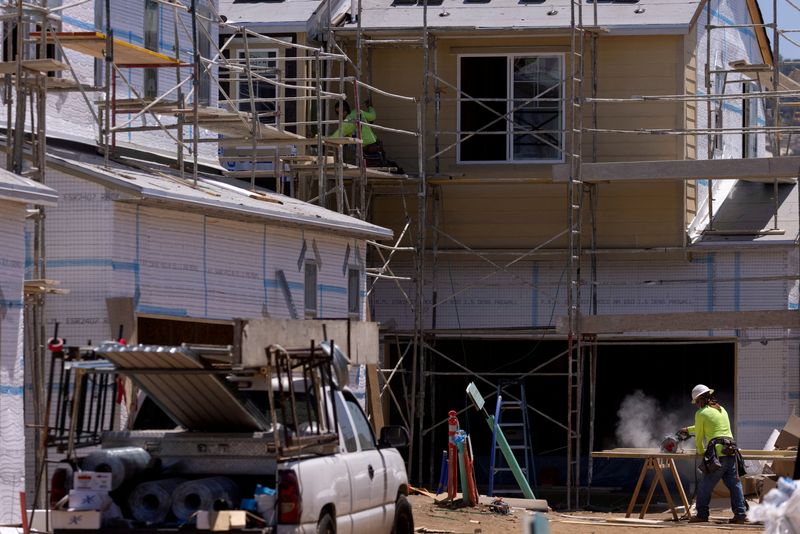 &copy; Reuters. FILE PHOTO: Residential single family homes construction by KB Home are shown under construction in the community of Valley Center, California, U.S. June 3, 2021.   REUTERS/Mike Blake/File Photo/File Photo