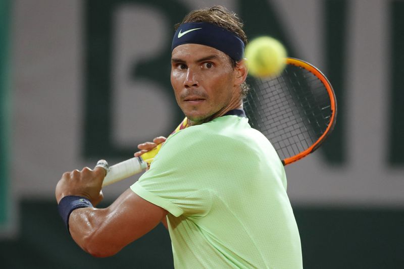 © Reuters. Foto de archivo ilustrativa de  Rafael Nadal en acci[on ante Novak Djokovic en las semifinales de Roland Garros
Jun 11, 2021
 REUTERS/Sarah Meyssonnier