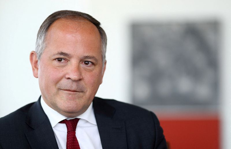 &copy; Reuters. FILE PHOTO: Benoit Coeure, then a board member of the European Central Bank, is photographed during an interview with Reuters journalists at the ECB headquarters in Frankfurt, Germany, May 17, 2017. REUTERS/Kai Pfaffenbach/File Photo