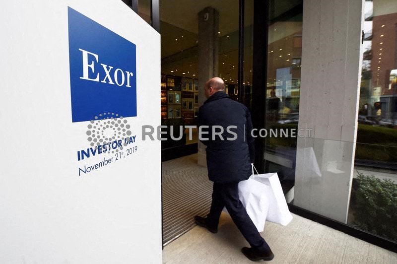 &copy; Reuters. The Exor logo is seen on investor day held by the holding group of Italy's Agnelli family in Turin, Italy, November 21, 2019. REUTERS/Massimo Pinca