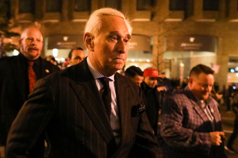 &copy; Reuters. FILE PHOTO: Roger Stone, a longtime friend and adviser of U.S. President Donald Trump, walks as supporters of Trump and members of the far-right Proud Boys march the night before rallies to protest the U.S. presidential election results, in Washington, D.