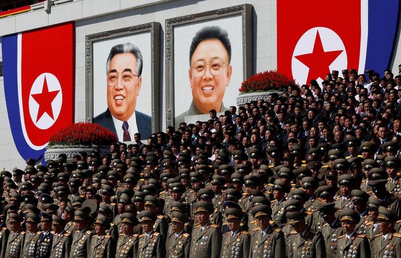 &copy; Reuters. FILE PHOTO: Senior military officials watch a parade as portraits of late North Korean leaders Kim Il Sung and Kim Jong Il are seen in the background at the main Kim Il Sung square in Pyongyang, North Korea, September 9, 2018. REUTERS/Danish Siddiqui/File