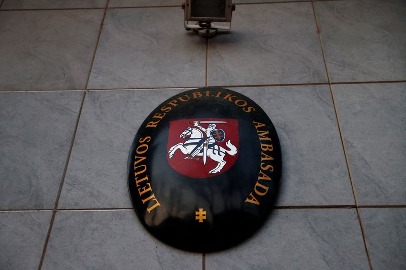 &copy; Reuters. FILE PHOTO: The Lithuanian state emblem is seen at its embassy in Beijing, China December 15, 2021. REUTERS/Carlos Garcia Rawlins/File Photo