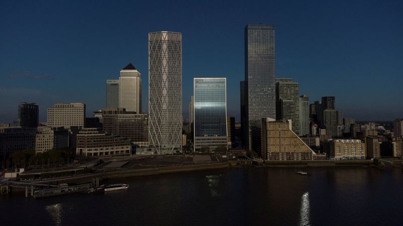 &copy; Reuters. FILE PHOTO: A general view of the Canary Wharf financial district in London, Britain April 25, 2021.  Picture taken April 25 with a drone. REUTERS/Kevin Coombs