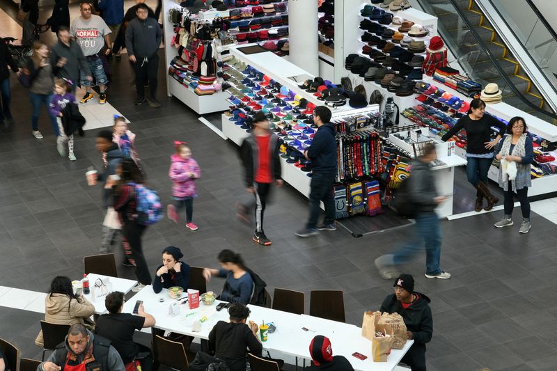 &copy; Reuters. FILE PHOTO: Holiday shoppers look for deals at the Pentagon City Mall in Arlington, Virginia, U.S., November 29, 2019. REUTERS/Loren Elliott