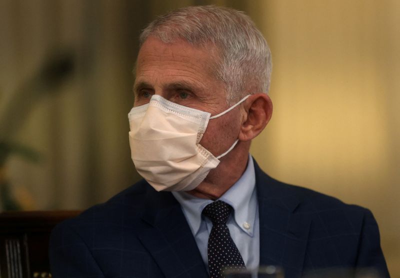 &copy; Reuters. FILE PHOTO: Dr. Anthony Fauci takes part in a meeting with U.S. President Joe Biden and Vice President Kamala Harris and other members of the White House COVID-19 Response Team on developments related to the Omicron COVID-19 variant from the State Dining 