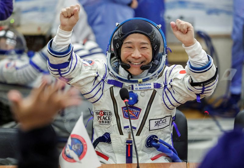 Japan billionaire Maezawa lands in Kazakhstan after 12-day space flight
