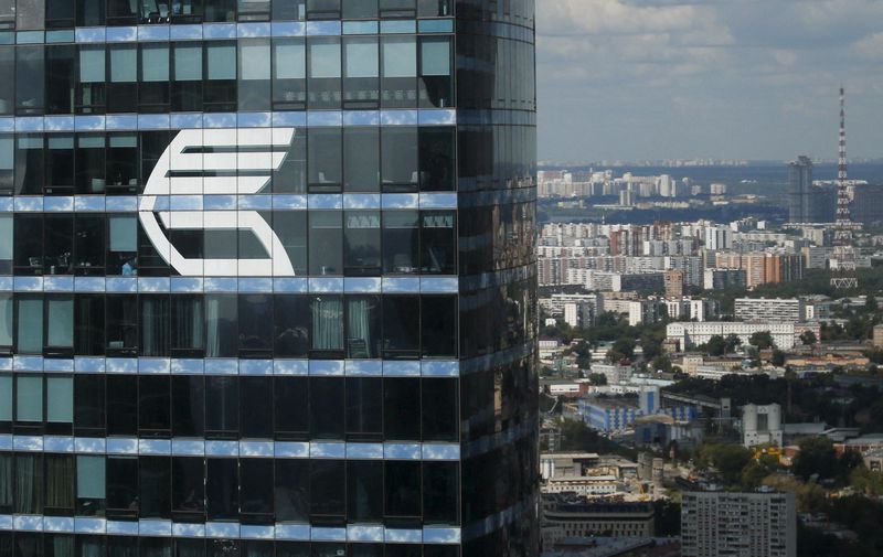 &copy; Reuters. FILE PHOTO: The logo of VTB Group is seen through a window of Imperia Tower on the facade of the Federatsiya (Federation) Tower at the Moscow International Business Center also known as "Moskva-City", in Moscow, Russia, in this August 5, 2015 file photo. 