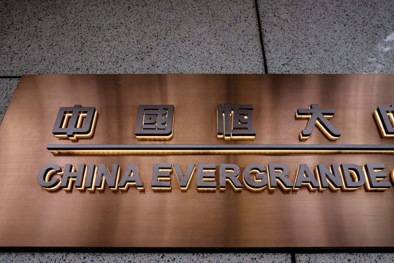 &copy; Reuters. FILE PHOTO: The China Evergrande Centre building sign is seen in Hong Kong, China December 7, 2021. REUTERS/Tyrone Siu