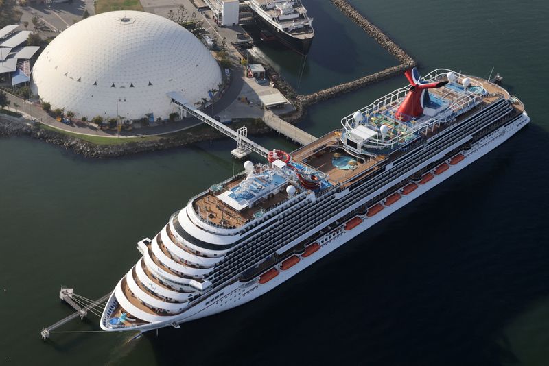 &copy; Reuters. FILE PHOTO: A Carnival cruise ship is docked, amid the coronavirus disease (COVID-19) pandemic, in Long Beach, California, U.S., April 7, 2021. REUTERS/Lucy Nicholson