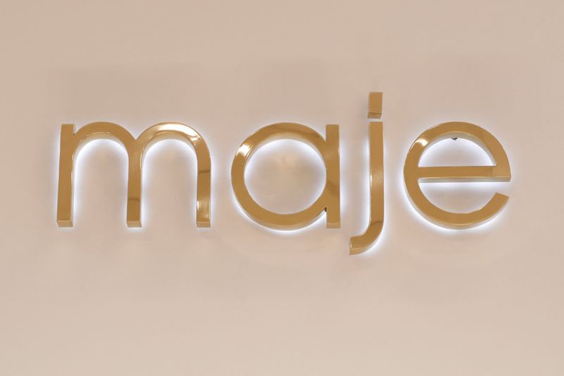 &copy; Reuters. FILE PHOTO: The Maje logo sits inside an outlet of the luxury clothing store, operated by SMCP Group, in Paris, France, December 21, 2017. REUTERS/Benoit Tessier