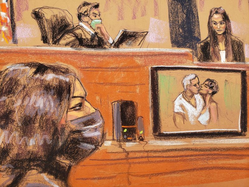 &copy; Reuters. FILE PHOTO: A photo of Ghislaine Maxwell and Jeffrey Epstein is shown as FBI analyst Kimberly Meder testifies during the trial of Maxwell, the Jeffrey Epstein associate accused of sex trafficking, in a courtroom sketch in New York City, U.S., December 7, 