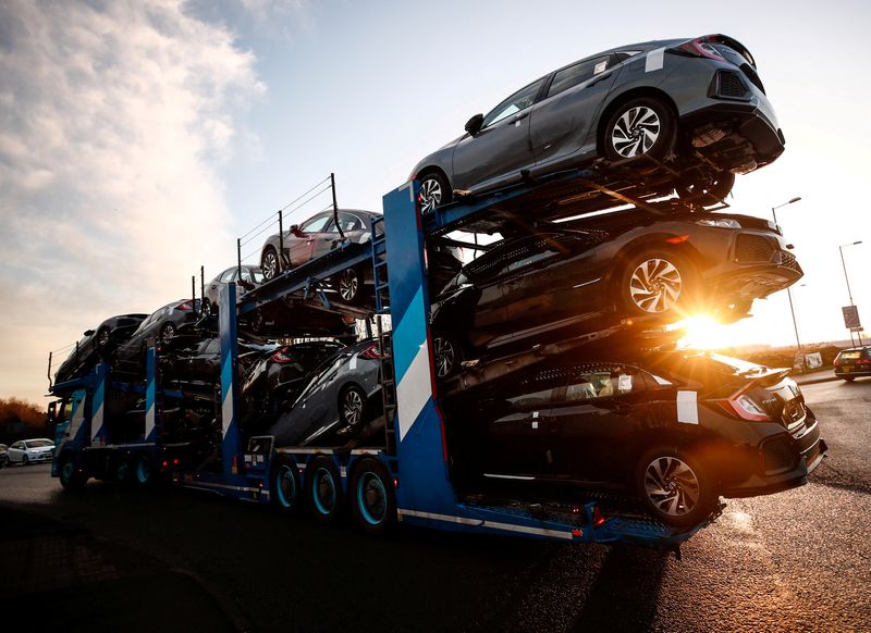 &copy; Reuters. FILE PHOTO: A lorry with car carrier trailer leaves the Honda car plant in Swindon, Britain, February 18, 2019. REUTERS/Eddie Keogh