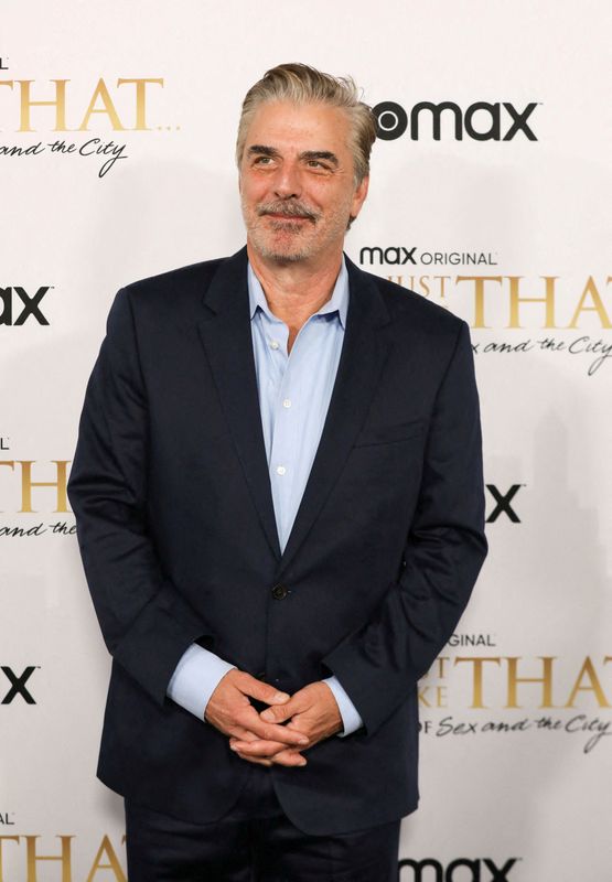 &copy; Reuters. FILE PHOTO: Chris Noth poses during the red carpet premiere of the 'Sex and The City' sequel, 'And Just Like That' in New York City, U.S. December 8, 2021. REUTERS/Caitlin Ochs