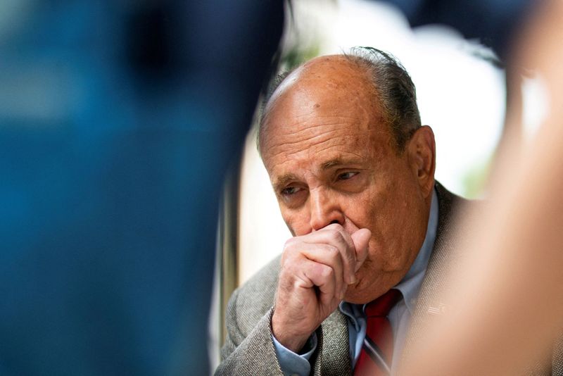 Two Georgia poll workers sue One America News, Giuliani over debunked fraud claims