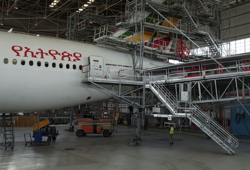 &copy; Reuters. FILE PHOTO: A worker is seen near of an Ethiopian Airlines passenger carrier to be converted into a cargo plane at the Ethiopian Airlines hangar within the Bole international airport in the Addis Ababa, Ethiopia May 15, 2020. REUTERS/Giulia Paravicini