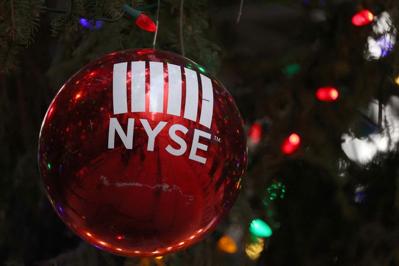 &copy; Reuters. A decoration hangs on a Christmas tree outside the New York Stock Exchange (NYSE) on the last day of trading before Christmas in Manhattan, New York City, U.S., December 23, 2021. REUTERS/Andrew Kelly