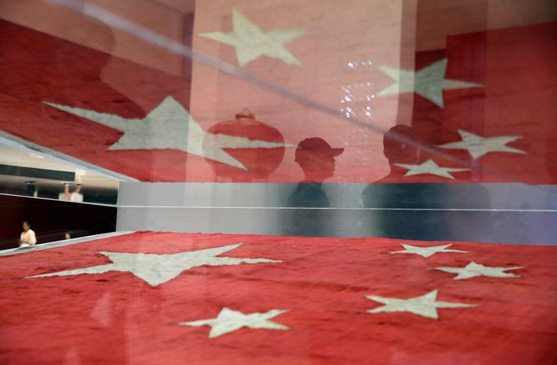 &copy; Reuters. Bandeiras da China, em Pequim
 22/8/ 2019  REUTERS/Jason Lee