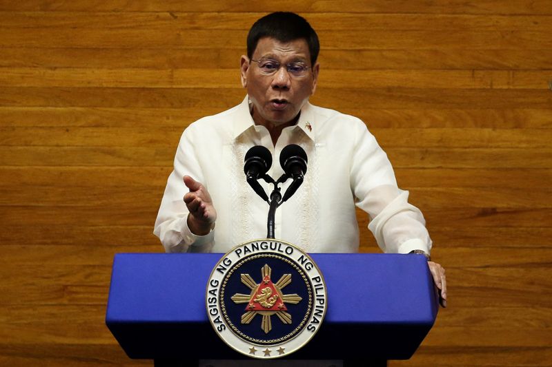 &copy; Reuters. Philippine President Rodrigo Duterte gestures as he delivers his 6th State of the Nation Address (SONA), at the House of Representative in Quezon City, Metro Manila, Philippines, July 26, 2021. REUTERS/Lisa Marie David/File Photo