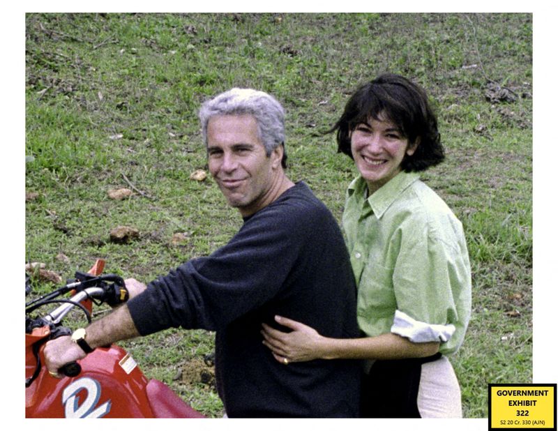 © Reuters. FILE PHOTO: An undated photo shows Jeffrey Epstein and Ghislaine Maxwell. The photo was entered into evidence by the U.S. Attorney's Office on December 7, 2021 during the trial of Ghislaine Maxwell, the Jeffrey Epstein associate accused of sex trafficking, in New York City.  Courtesy via U.S. Attorney's Office/Handout via REUTERS  