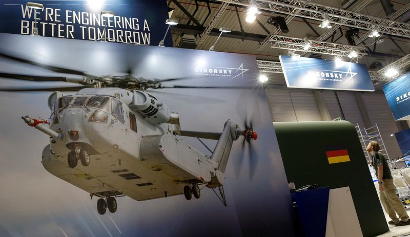 &copy; Reuters. FILE PHOTO: A photograph of a CH-53 helicopter is pictured at the booth of Sikorsky - Lockheed Martin company during preparation for the ILA Berlin Air Show in Schoenefeld, south of Berlin, Germany, May 31, 2016.    REUTERS/Fabrizio Bensch/File Photo